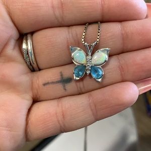 (Lab-created opal, blue topaz & diamond butterfly pendant in 10k white gold)